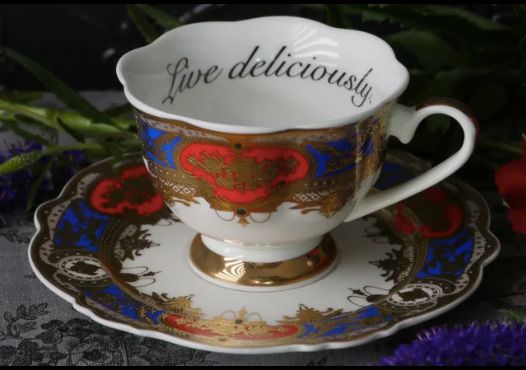 Madame Havishham’s Versailles ‘Live Deliciously’ teacup and saucer